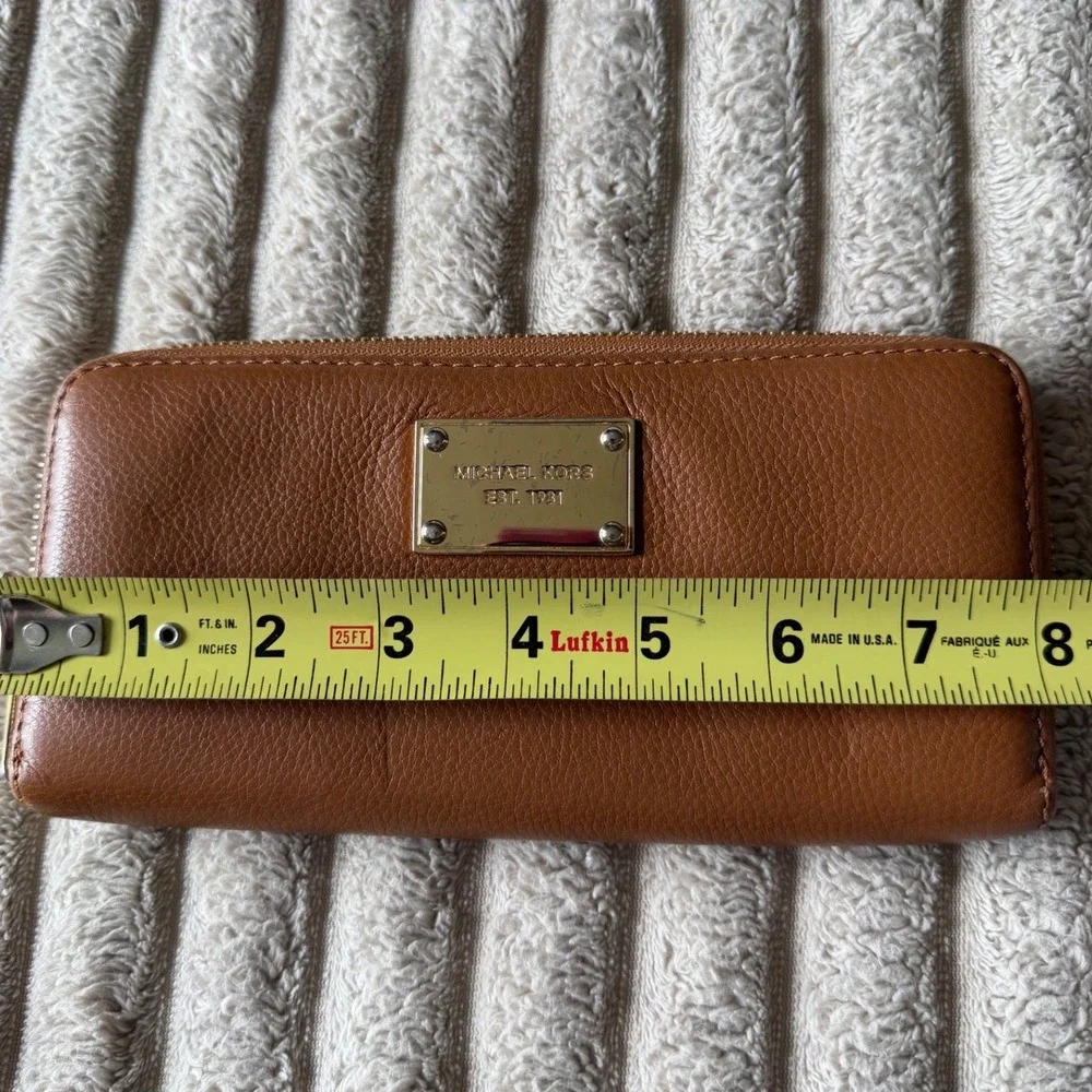 Michael Kors Tan Pebbled Leather Zip Around Continental Wallet Gold Logo Plaque